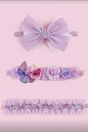 vincha de chonguito y  flores color fusia