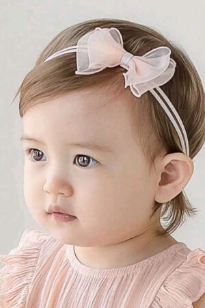 Vincha rosa para niña: suave, cómoda y perfecta para cualquier ocasión.”