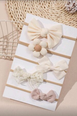 Vinchas de chonguito y flor color beishe