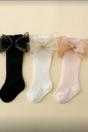 Calsetines altos con chongo arriba