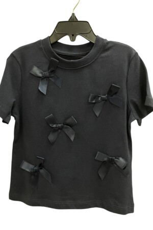 Blusa negra para niña con moños decorativos 🎀